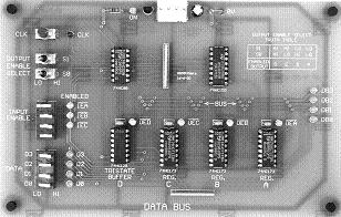 The first consists of a PCB with top-over-layer printing showing distinctive shapes of gates and flip-flops with associated sockets for inputs and outputs that may be physically