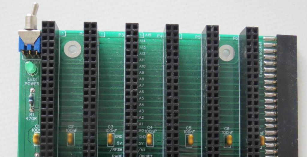 This backplane section has six RC204 (80 pin) card sockets, a power supply input and an 80 pin edge mounted