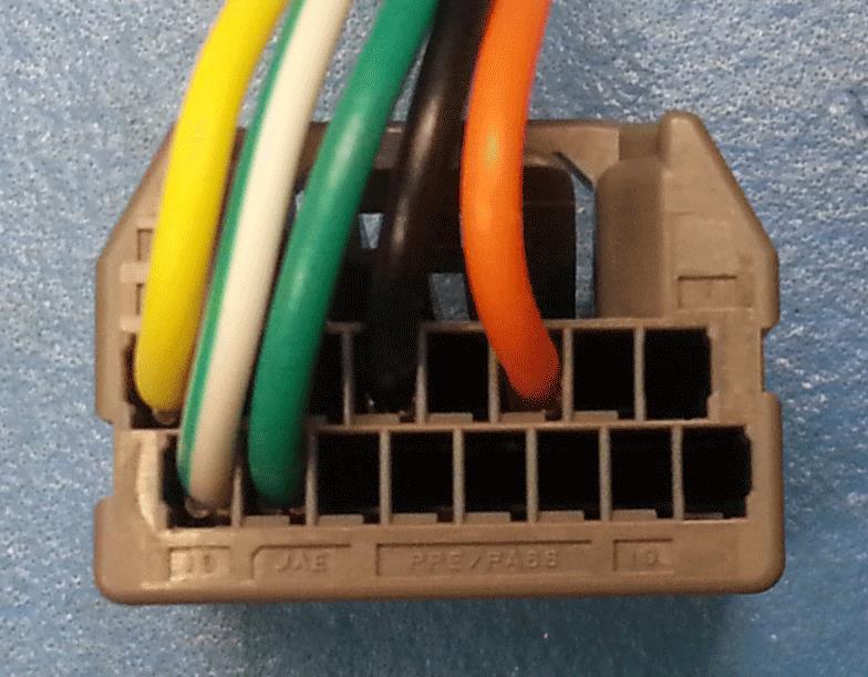 with the factory Volvo screen s plug: make certain the wire locations match (are in the same position). 4. Plug the factory power/can harness into the female side of the supplied T-Harness.