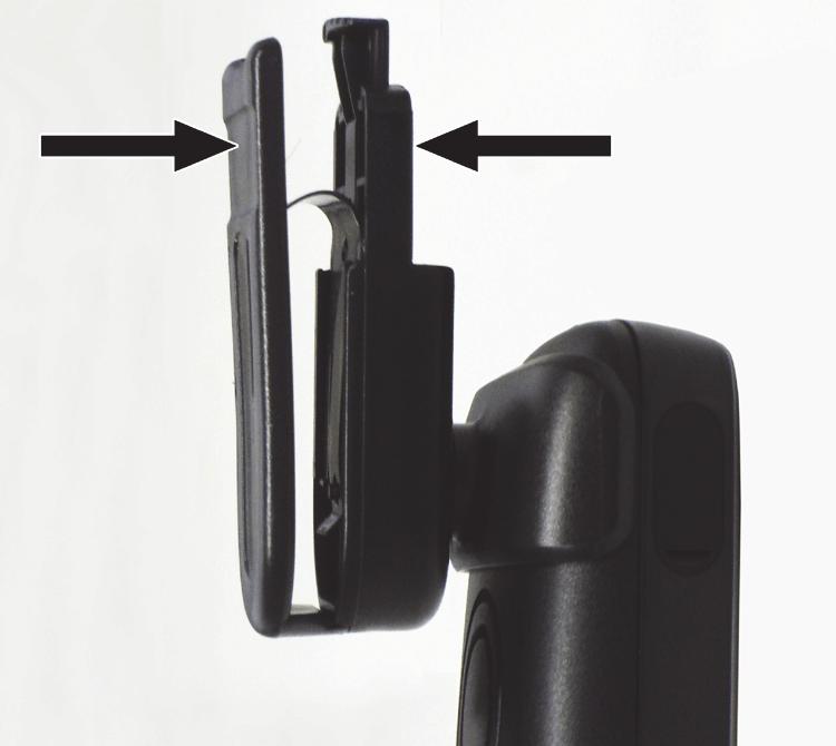 Secure the handset with the attachment clip to the belt.
