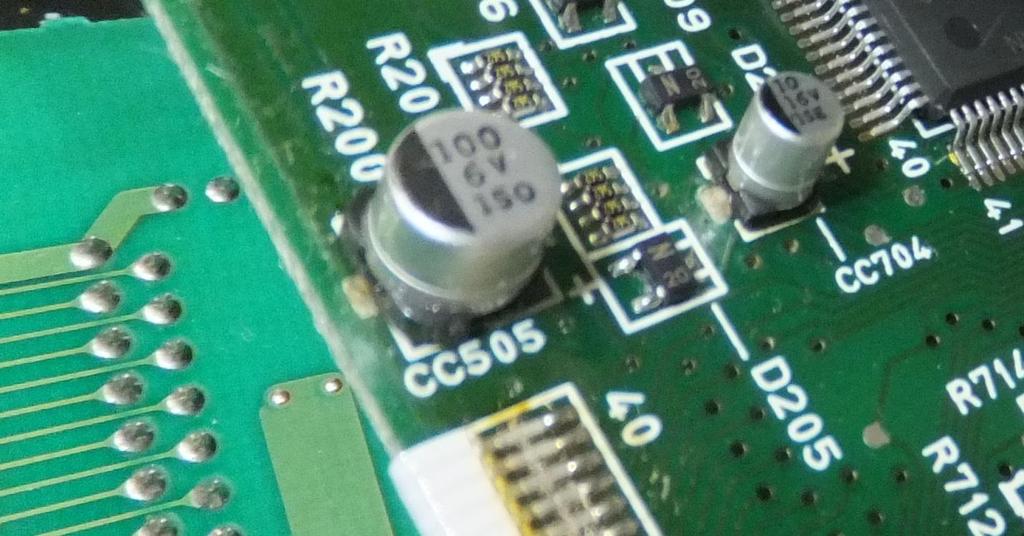 Sega Nomad Capacitor Replacement Kit Installation Guide Page 14 of 21 The capacitor seen in picture six above features a radial mounting, hence called because it has legs that originate from the