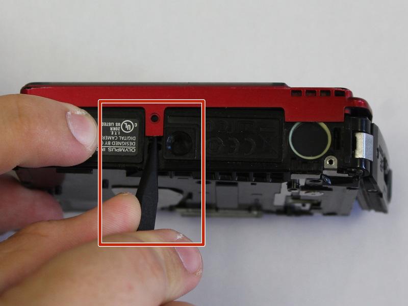 Step 10 Rotate to bottom of camera and locate bottom latch.