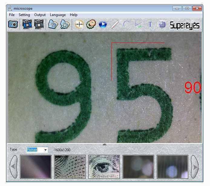 The image shows letters on a US dollar Note: After measurement, please click angle button again to go back to photo preview. 8.5.