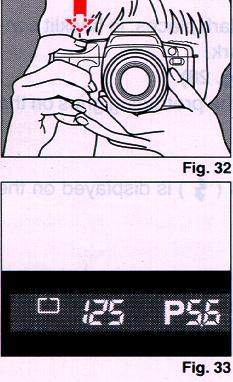 18. SHOOTING 1. Press the Shutter Button halfway. (Fig. 32) * A display will appear at the bottom, inside the viewfinder. * The Shutter Button can be pressed in two ways.
