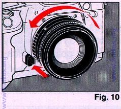 4. To remove the lens, press the Lens Release Button, then turn the lens in the direction shown by the arrow. (Fig.