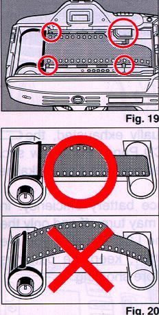 Load the Film Cassette into the Film Chamber and pull out enough film leader to extend just beyond the Film Leader Index against the Take-up Spool. (Fig.