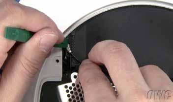 31. Reattach the Airport cable by pulling back