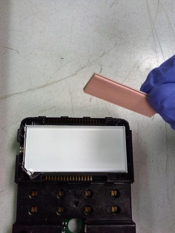 For temporary fix, clean along the edges of the LCD for best results. 4.