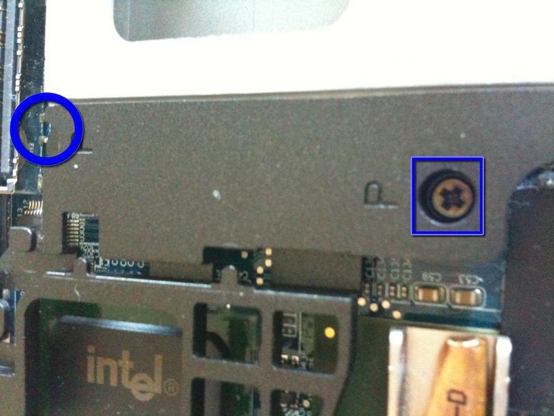 remaining screws on the laptop with a Phillips