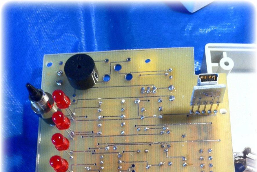 Your PCB should look like the one below with everything soldered in place. Install the signal and headphone jacks in the box.