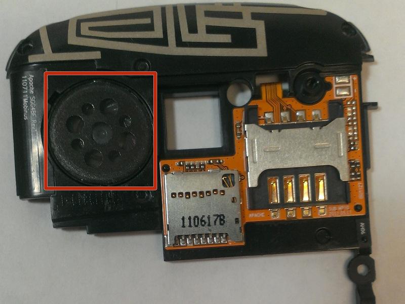 Gently push against the back of the speaker with a very small screw driver or