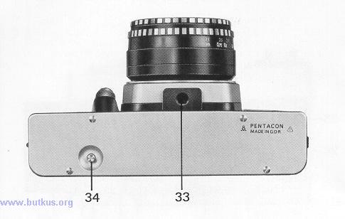 30. Take-up spool 31. Marking point for inserting the film 32. Wire bracket 33. Tripod socket 34.