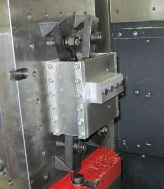 Figure 5. Setup for validation testing. The parallelogram type flexure and attached workpiece are mounted to the machine tool's tombstone.