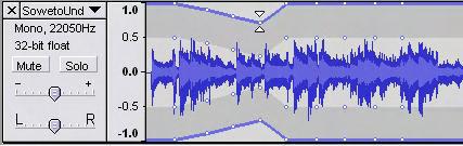 Now comes the job of gradually pulling the wave form toward the center to mute the sound. Use the same fade tool.