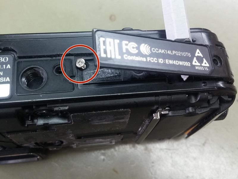 remove the single Philips screw under it.