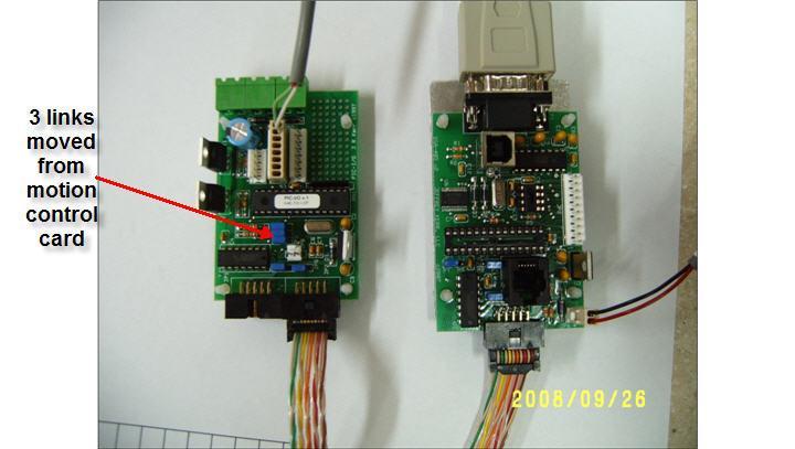 the 3 blue links from the input/output card and put them on the first motion control card. Plug the 12v back in to the communication card.(fig 10.