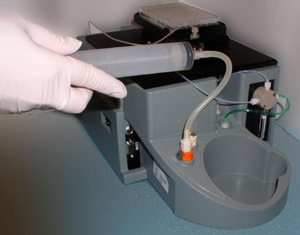 Treat the sample probe and tubing as biohazardous waste and dispose of them according to local regulations.