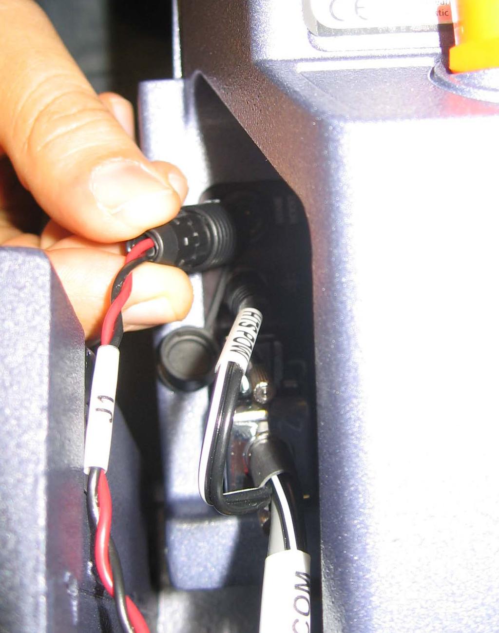 Figure B-9 Plugging door sensor cable into HTS (BD FACSCanto II only) door sensor cable (Match the arrow on the plug with the arrow on the HTS connector.