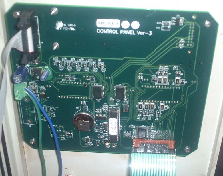 Turn off the power to the controller and connect the other end of the 2-wire cable the communication terminal block on the controller board, with the black wire to the bottom (+) position and the