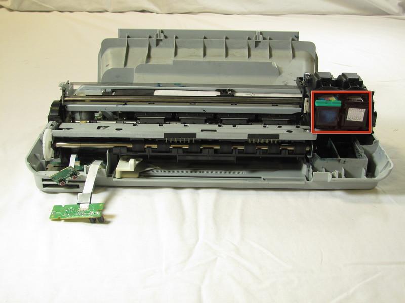 Step 16 Remove both of the ink cartridges by