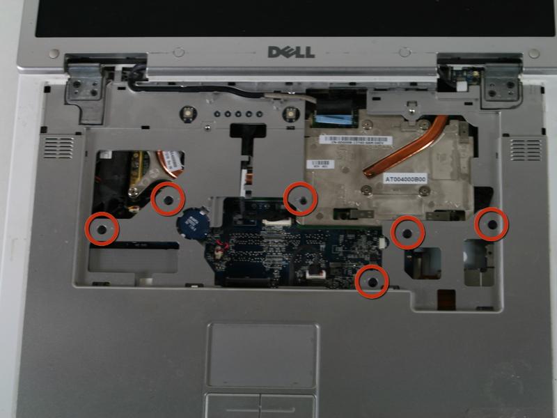 Step 7 Using a Phillips head screwdriver, remove the screws shown in the image.