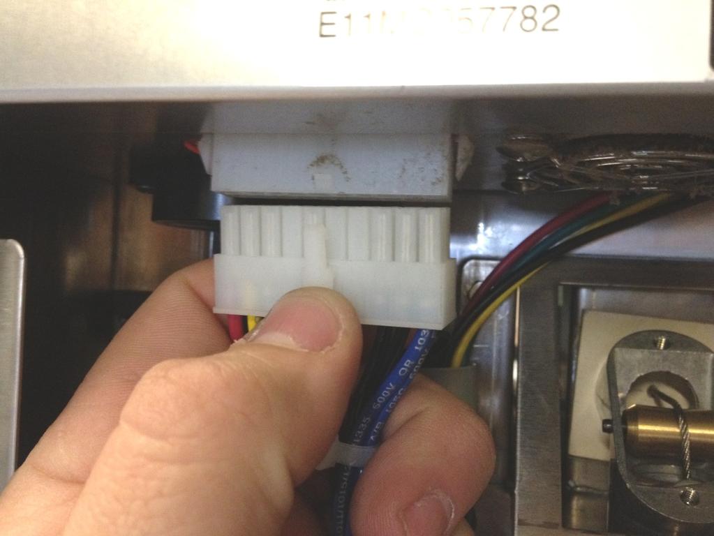 6. Disconnect 20 pin Molex plug from bottom side of EBOX.