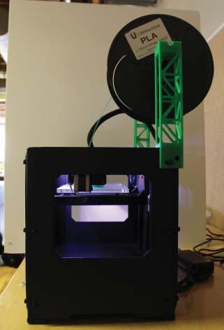 is set up with the top-mounted spool holder, no guide tube will be necessary.