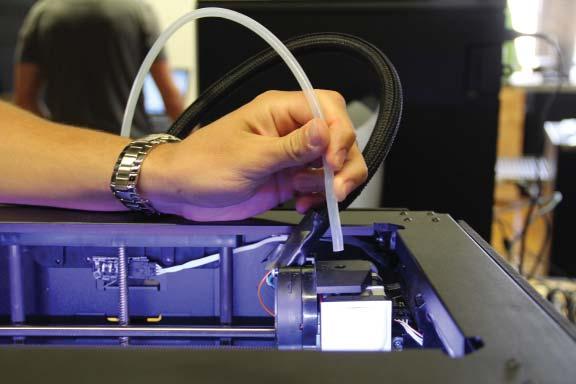 On the 3D Printer Menu, Press the arrow down to Utilites. Select Utilites -> Change Filament -> Load.