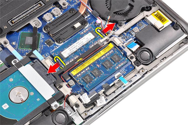 4. Lift and remove the memory module from its connector. 5. Repeat steps 2 and 3 to remove the second memory module. Installing the Memory 1. Insert the memory module into the socket. 2. Press the retention clips to secure the memory module to the system board.