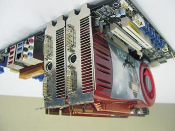 Step 2. Connect two Radeon graphics cards by installing a CrossFire Bridge on the top of the Radeon graphics cards.