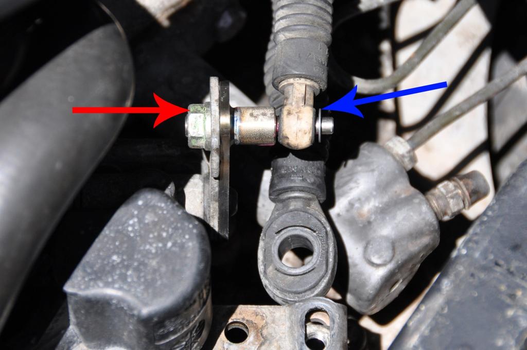 Step 7: Install adjustment nut. Install your original Adjustment Nut (Red Arrow) on the Grüvenpart s Relay Lever Driver. Before tightening hand-tight, roughly center the adjustment.