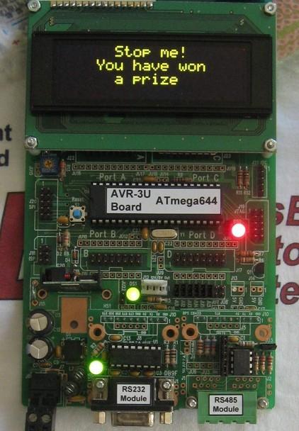 This AVR-3U board has a Newhaven 4x20 character display added (Newhaven part# NHD-0420DZW-AY5 for Yellow).