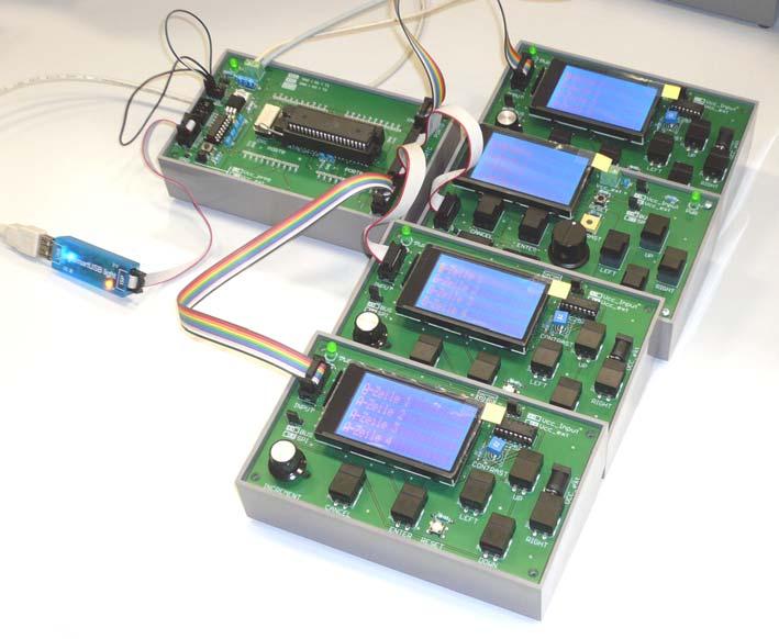 A microcontroller module supports four human interface modules.