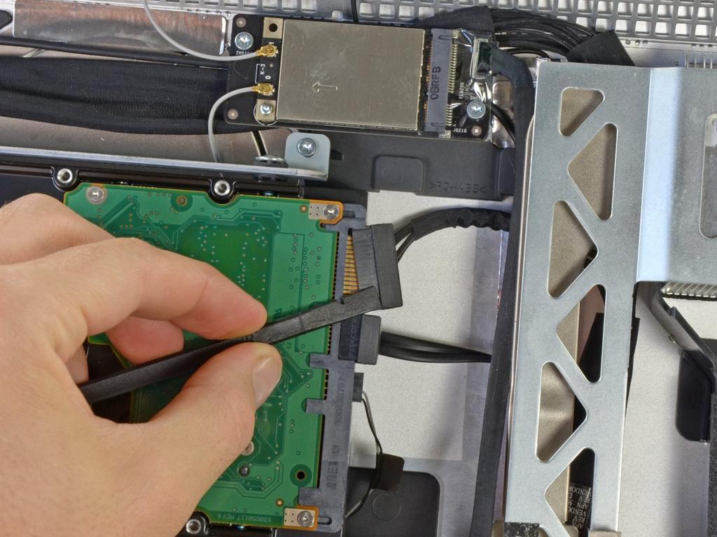 3 mm screw When reassembling the imac, make sure that none of the cables are trapped underneath the logic