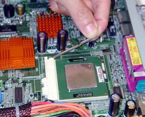 3. Heat Sink Installation Place the heat sink on top of the CPU with the clip handle on