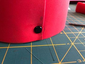 then push the rivet through from the outside in.