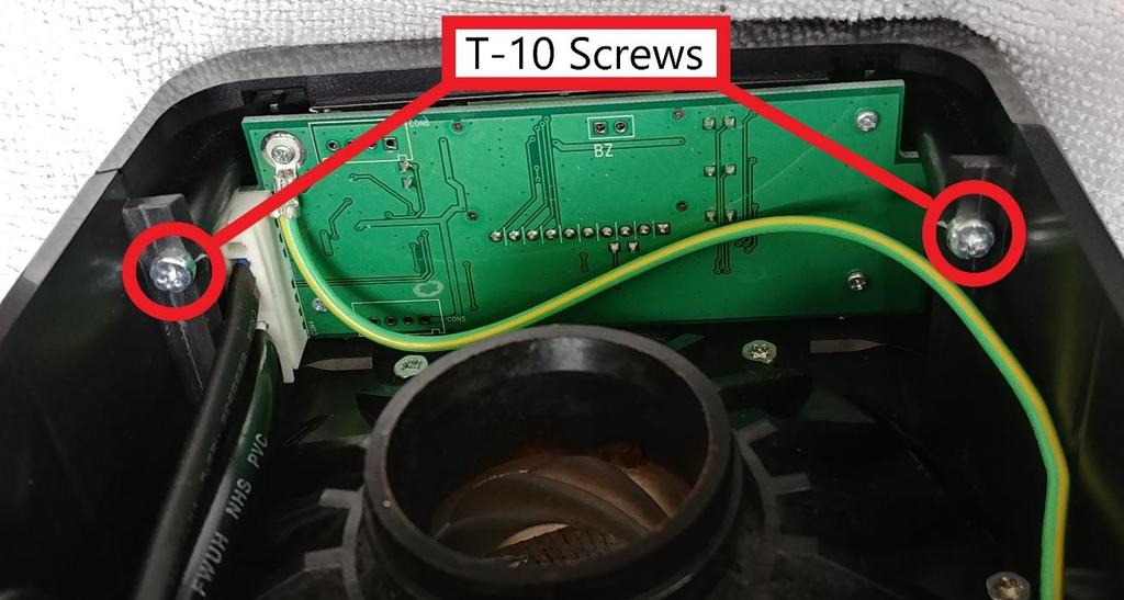 Remove the two T10 screws that secure the screen from the back.