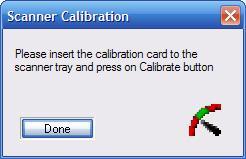 4. Find the calibration card included with your scanner and insert it into the scanner with the dark boxes facing down, then click Calibrate button to proceed with the calibration.