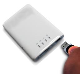 Simply insert the any USB Mass Storage device including Flash Drives, External Hard Drive and card readers into the USB port of the device as seen the