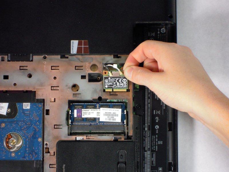 lift the wireless card out of its slot.