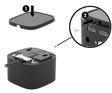 6. Place the bottom panel on the docking station (1), and then secure it