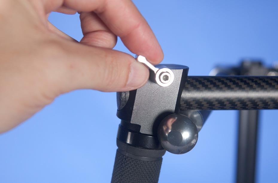 Figure 4 Insert and secure the self locking screws (20mm) onto both grips.