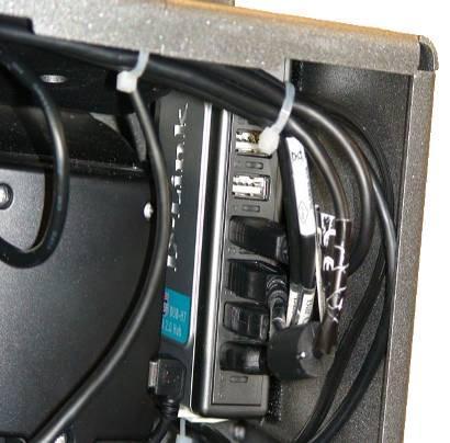 You will see the following: Assist Station with rear access panel open; the area circled in red is the location of the USB hub, as detailed on the right.