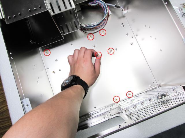 Insert the standoffs to the predrilled screw holes in the bottom plate 2.