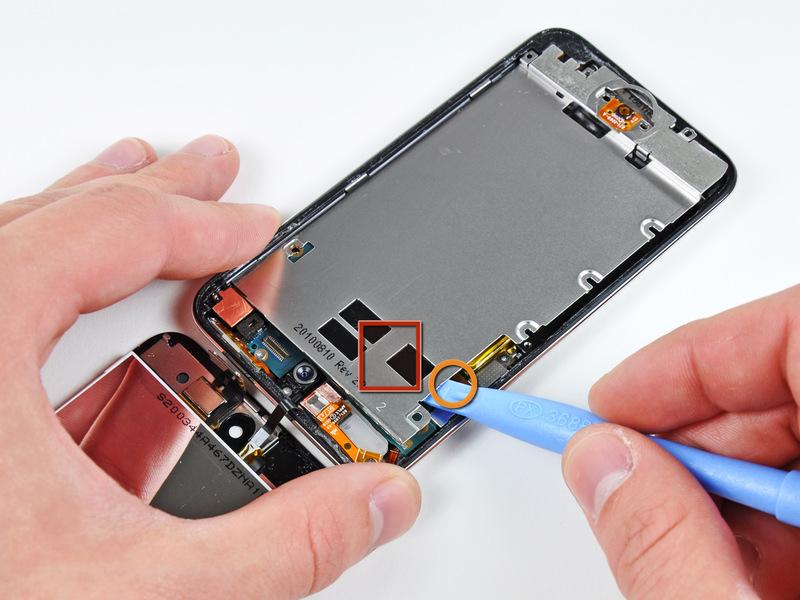 If the plate is still attached to the logic board re-warm the area to loosen the adhesive, then separate the plate from the logic board using the opening tool Use extreme care, the speaker is under