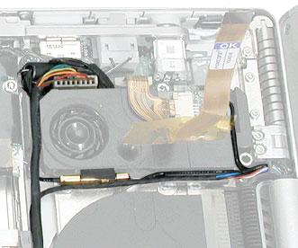 5. Verify that cables for Bluetooth, AirPort Extreme, inverter and power cable from the DC-in board are routed and seated correctly in channels around the left speaker. 6.