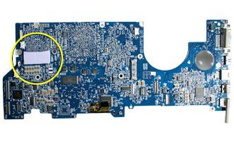 2. On the back side of the logic board, remove the existing rectangular thermal pad covering two chips, shown below.