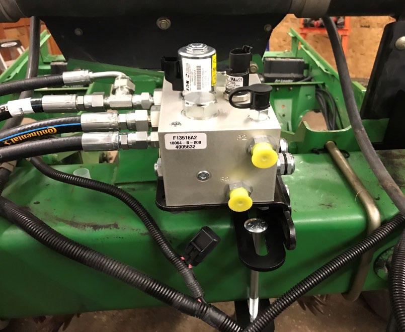 Planter Frame & Tractor Components Installation Procedure: 6. Determine mounting location for main SureForce TM valve block within 5 feet of the center of toolbar.