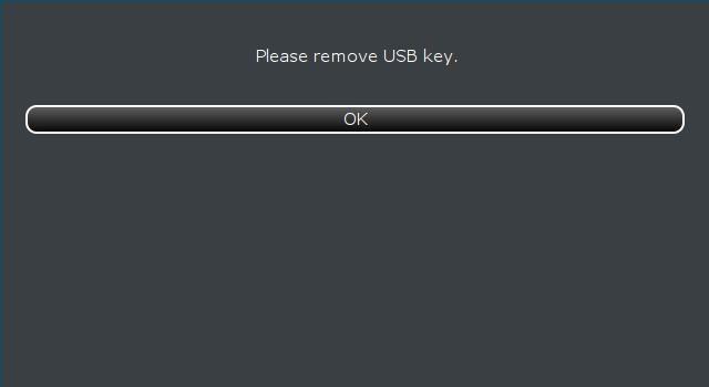 When the upgrade is complete, the unit will prompt to remove the USB stick. Remove the USB stick and use the navigation control to select OK. 7. VOCO will now require a reboot.