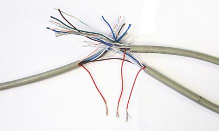 Give some slack (no more than 24 ) on each CAT5 to strip the wires and splice them together.